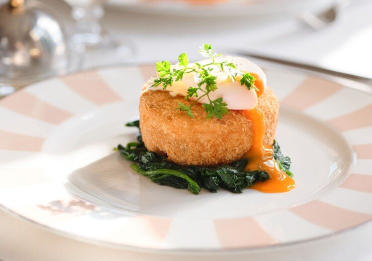 Fish cake with poached egg